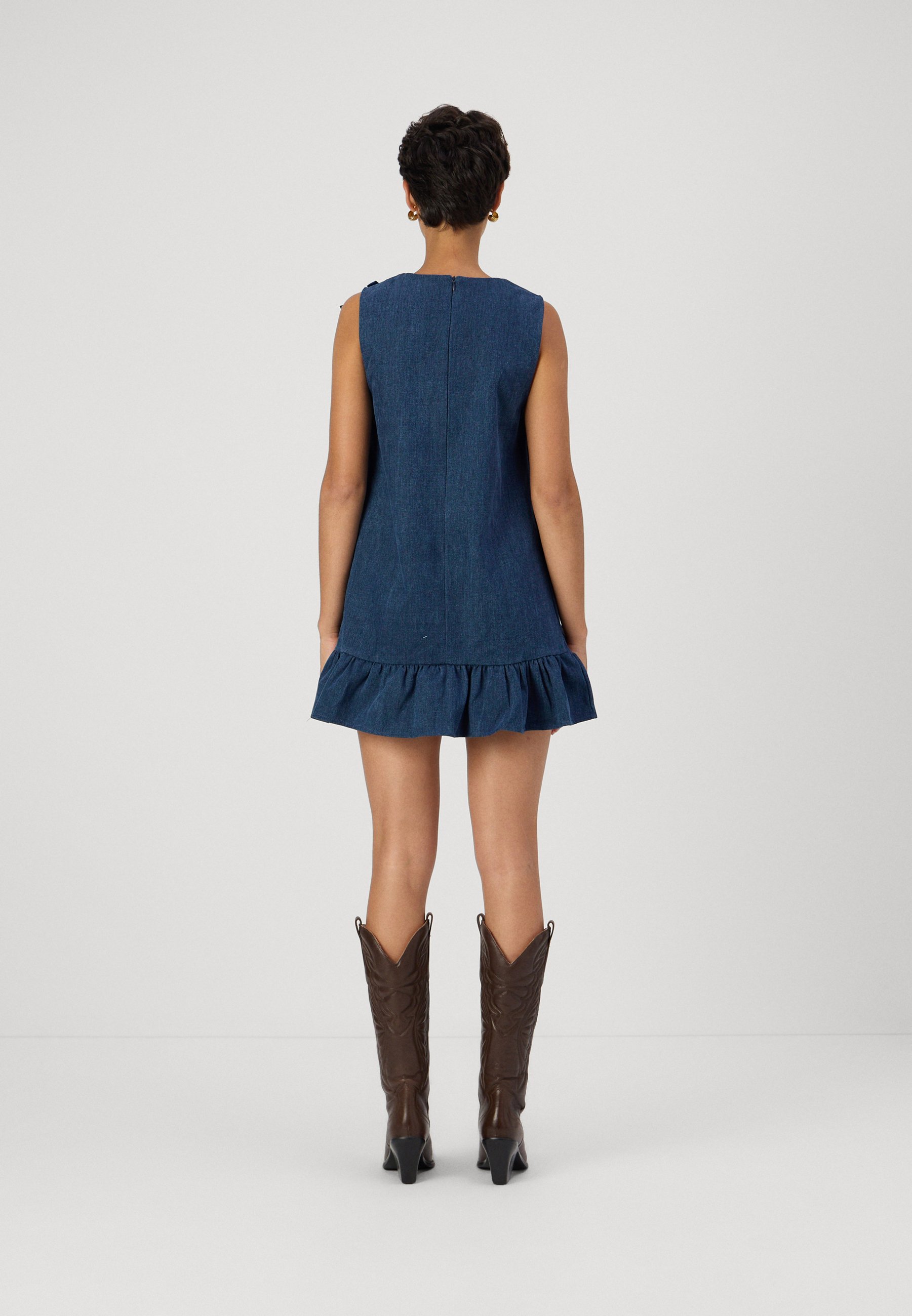 【英国発Sister Jane】Lyrical bow-embellished denim dress Sister Jane Lyrical Bow-Embellished Denim Mini Dress in Blue
