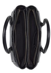 Black leather handbag with two zippered compartments, top handles, and a textured finish. Features gold-tone zippers and fabric lining.