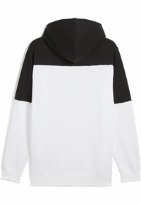 Hoodie s dizajnom u blokovima boja, s gornjim dijelom u crnoj boji i bijelim tijelom. Izrađen od mekog materijala s rebrastim manžetama.