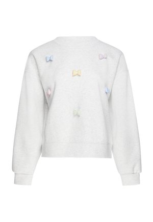 Hvid sweatshirt med lange ærmer med seks små pastelfarvede stofsløjfer arrangeret foran.
