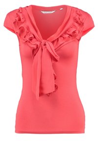 Coral short-sleeve shirt with ruffled neckline and tie detail at the front. Made of soft fabric with a fitted shape.