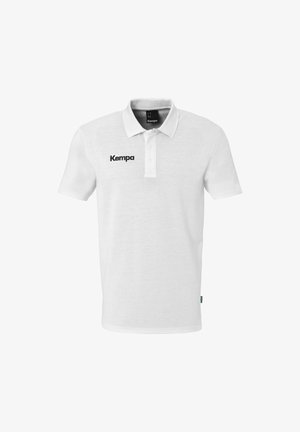 Polo shirt blanc en coton avec des manches courtes, un col et une patte de boutonnage à trois boutons. Présente un logo "Kempa" noir sur la poitrine.