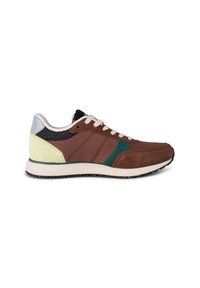 Brown suede and mesh sneaker featuring green and yellow accents, silver heel, and cream laces. The design includes textured panels and a lightweight sole.