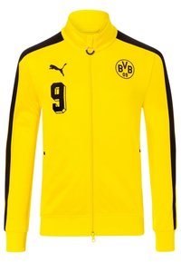 Chaqueta amarilla con cremallera, cuello alto, paneles laterales negros y acentos negros. Presenta el "9" y el logo del Borussia Dortmund en el pecho.