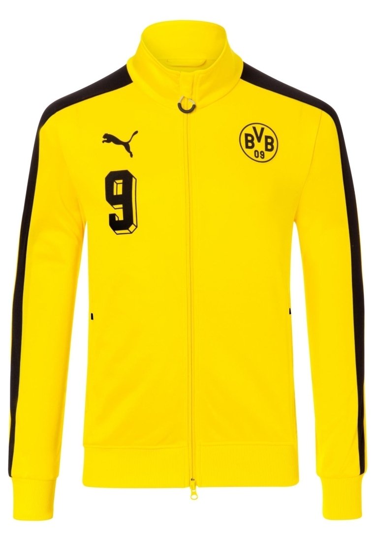 Chaqueta amarilla con cremallera, cuello alto, paneles laterales negros y acentos negros. Presenta el "9" y el logo del Borussia Dortmund en el pecho.