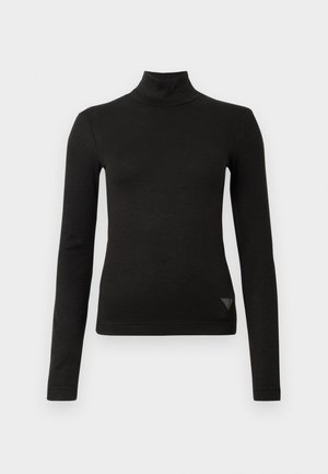 Svart langermet tettsittende polokrage topp med et lite trekantet logo detalj nær bunnsømmen på høyre forkant.