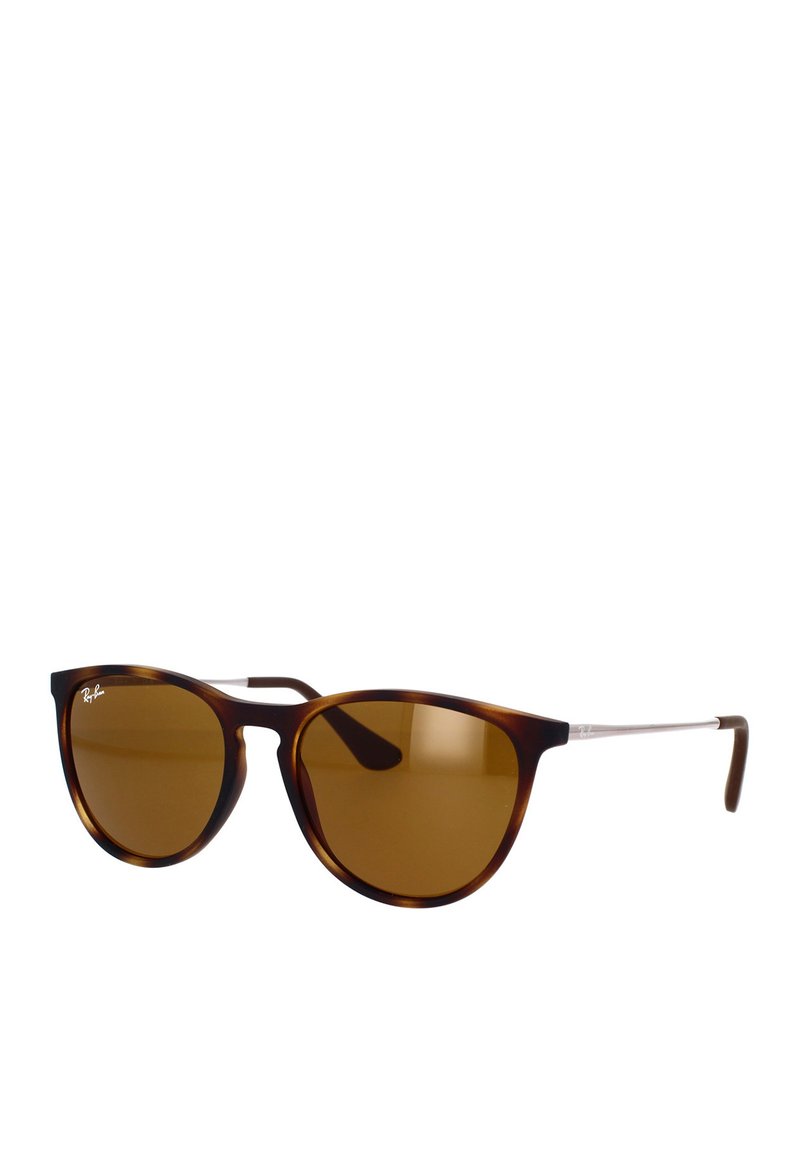 Occhiali da sole tortoise brown con forma a occhio di gatto e lenti marroni. Accenti in metallo argento sulle tempie. Logo visibile sul telaio.
