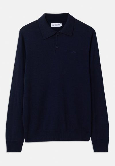 Marinblå långärmad polo med klassisk krage, två knappar och ribbade ärmmuddar; tillverkad av mjukt, slätt tyg med en subtil logodetalj.