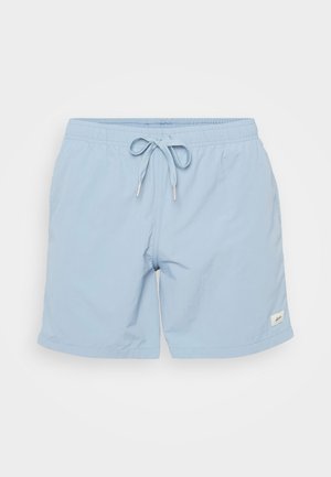 Helle blaue Badehose aus glattem, leichtem Stoff. Elastischer Bund mit Kordelzug und Seitentaschen; kleines Logo am Saum.