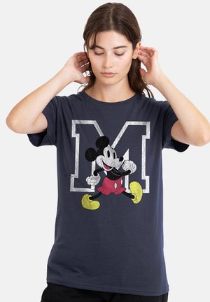 Navy blue cotton T-shirt featuring a graphic of Mickey Mouse and a large white "M." Short sleeves and a relaxed fit.