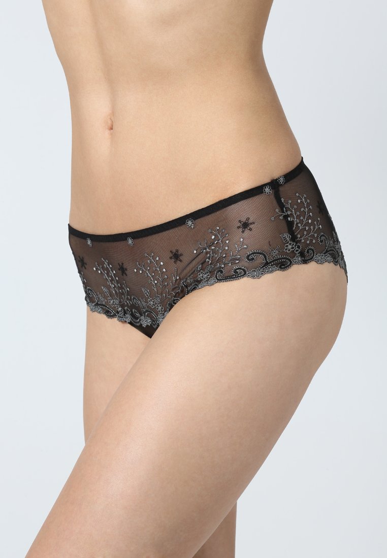 Svart gjennomsiktig blonde truser med intrikate blomstrete broderier, bølgete kanter og en behagelig elastisk midje.