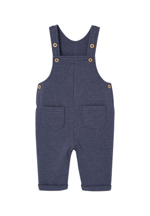 Marineblaue Baumwoll-Overalls mit verstellbaren Trägern, Holzknöpfen, zwei Fronttaschen und umgeschlagenem Saum an den Beinen. Weiche Textur.