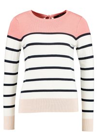 Randig tröja med en rosa övre del, en krämfärgad bas och marinblå linjer. Har en rund hals med ett knytband på baksidan. Mjuk stickad textur.