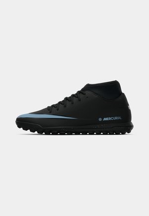 Black athletic shoe with a high-cut design, featuring a light blue accent on the toe and textured outsole for traction. Mercurial branding displayed.