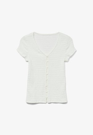 Hvid, tekstureret kortærmet top med V-hals og frontknaplukning. Har et subtilt krøllet design og blødt stof.