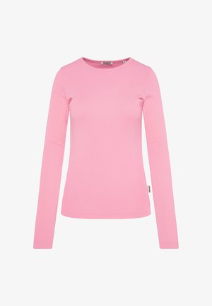 Langärmliges, figurbetontes Hemd aus einfarbigem Baumwollstoff in Pink. Verfügt über einen runden Halsausschnitt und eine gerippte Textur, mit einem kleinen Markenlabel an der Seite.