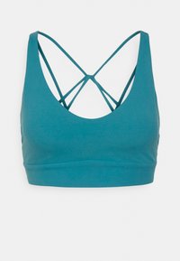Top desportivo em azul-petróleo com decote arredondado e design de costa em cruz. Feito de material liso e elástico, apresenta uma faixa larga na parte inferior para suporte.