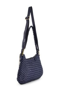 Navy woven leather shoulder bag with a braided strap, gold-tone hardware, and a textured surface. Smooth zipper closure on top.