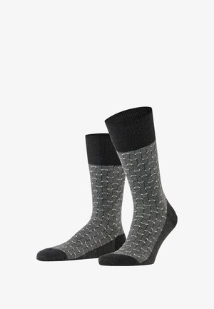 Calze grigie con motivo a trama e bordo a costine scuro, con un design a griglia in grigio chiaro. Realizzate in tessuto morbido e testurizzato per il massimo comfort.