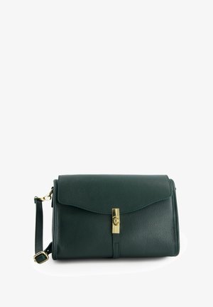 Green leather clutch bag with a flap closure, gold hardware, and detachable strap, featuring a textured finish.