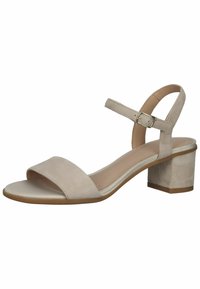 Sandalo con tacco in suede beige, con punte aperte, una larga fascia frontale, cinturino alla caviglia regolabile e tacco a blocco per maggiore stabilità.