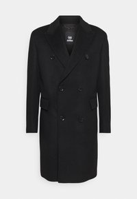 Sort dobbeltradet uldfrakke med hakket krave, to forlommer og seks knapper. Glat tekstur, knælængde design.