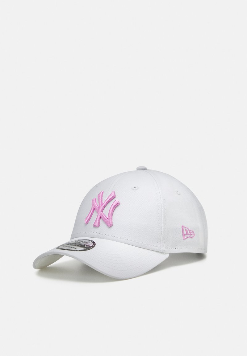 White baseball cap with pink embroidered NY logo, structured design, curved brim, and ventilation eyelets on the crown.