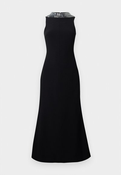 Black sleeveless dress featuring a fitted bodice and a flared skirt. The neckline is adorned with a textured silver pattern.
