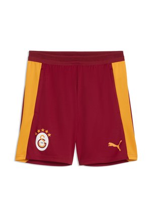 Maroon athletic shorts with yellow side panels, featuring Galatasaray logo and Puma logo on front.
