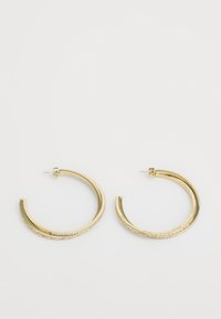 Selectat, yellow gold-coloured