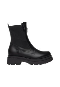 Stivaletto nero con suola spessa, cerniera laterale, pannello elastico e linguetta su sfondo bianco, che mostra il lato esterno.