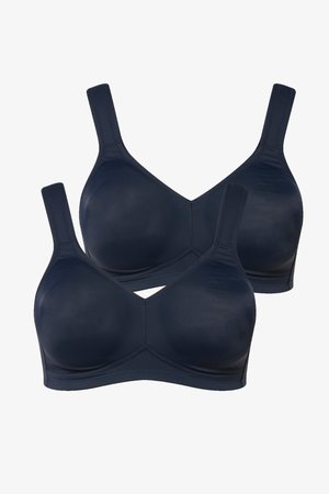 Zwei marineblaue drahtlose BHs mit breiten Trägern und glatten Cups, vor weißem Hintergrund dargestellt.