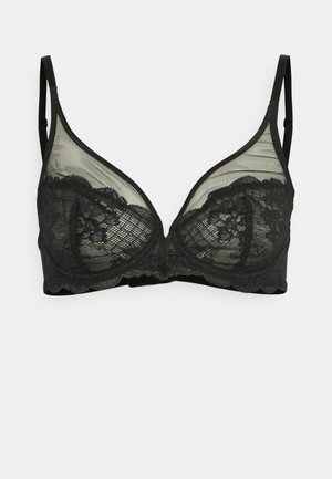 Soutien-gorge en dentelle noire avec des panneaux en maille transparente. Doté d'une forme triangulaire, de bords festonnés et de bretelles réglables. Design classique avec des accents floraux.