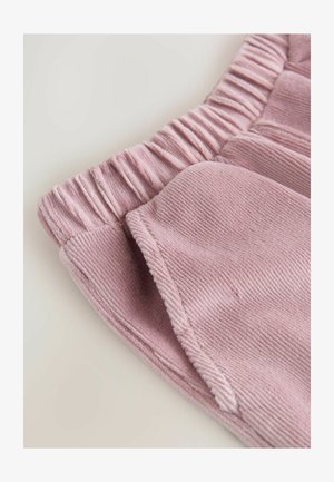 Helles rosa Cordstoffgewebe mit strukturiertem Oberflächen, ausgestattet mit gerafftem Gummibund und einem weichen, glatten Innenfutter.