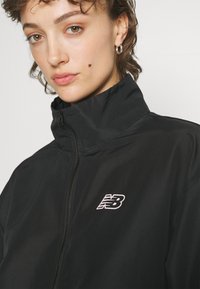 New Balance SPORT JACKET - Treniņjaka - black