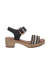 Black leather heeled sandal with a buckled ankle strap, woven upper featuring black, white, and beige patterns, wooden-look platform.