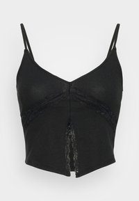 Top cropped preto com alças finas, com decote em V, apresentando detalhes em renda e uma fenda central, feito de tecido canelado.