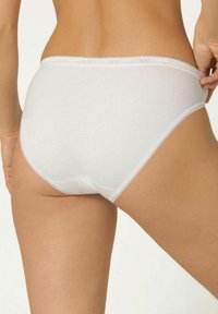 White cotton brief with a smooth texture, featuring a thin lace trim at the waist and leg openings, showcasing a simple, classic design.