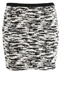 Zwart en witte gebreide minirok met een gestructureerd zigzagpatroon, elastische tailleband en een gestroomlijnde silhouette.