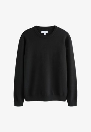 Sudadera negra, cuello redondo, mangas largas, textura suave, diseño liso, puños y dobladillo acanalados, etiquetada "NEXT", talla M.