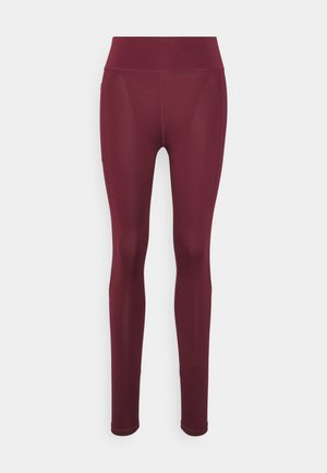 Burgundy leggings with a smooth texture, high waistband, and a fitted design; no visible patterns or hardware details.