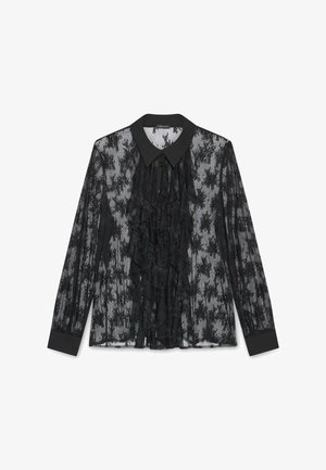 Zwarte doorzichtige blouse met een gerimpelde voorkant, lange mouwen en een klassieke kraag. Gedetailleerd patroon overal met effen zwarte manchetten en kraag.
