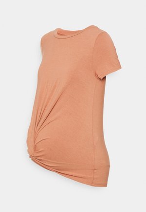 T-shirt de maternidade, mangas curtas, tecido pêssego suave, corte descontraído, detalhe de nó torcido na frente, decote redondo, textura lisa.