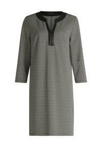 Zwart-wit jurk met patroon, 3/4 mouwen, V-hals en zwarte biezen. Gemaakt van zachte stof met een rechthoekig geometrisch ontwerp overal.