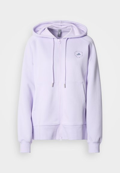 Svetlofialová mikina na zips s kapucňou so šnúrkami, prednými vreckami a kruhovým logom na ľavej strane hrudníka. Mäkká tkanina a rebrované manžety.