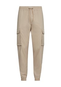 Beige cargobroek met een elastische tailleband, trekkoord en twee zijzakken. Gemaakt van een gladde stof met een taps toelopend ontwerp.