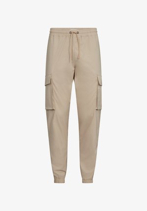 Beige Cargo-Hosen mit einem elastischen Bund, Zugband und zwei seitlichen Taschen. Hergestellt aus einem glatten Stoff mit schmal zulaufendem Bein Design.