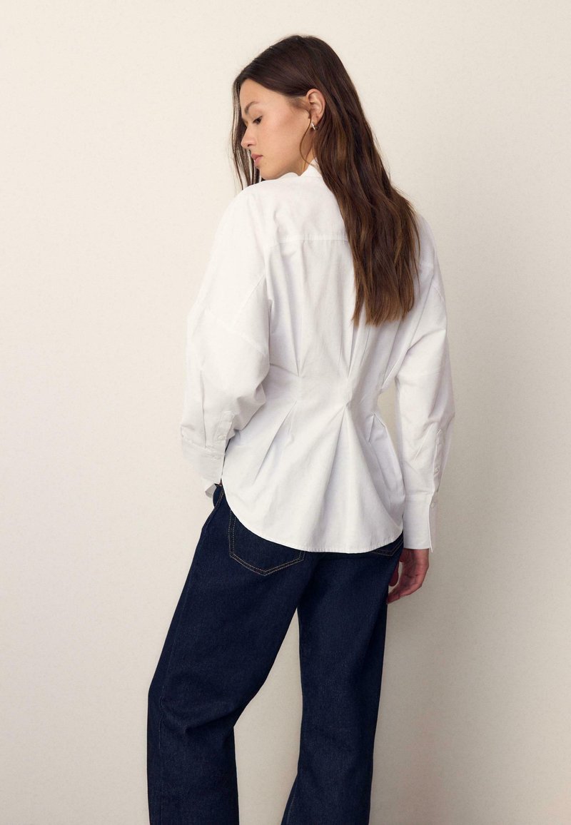 Blouse brodée manches courtes blanc femme | La Halle