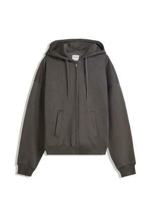 Grå zip-up hættetrøje med en rummelig hætte, forlommer og ribbede manchetter. Blødt stof, afslappet pasform og minimalistisk design.
