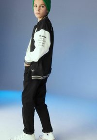 Next VARSITY - Geacă bomber - black skate